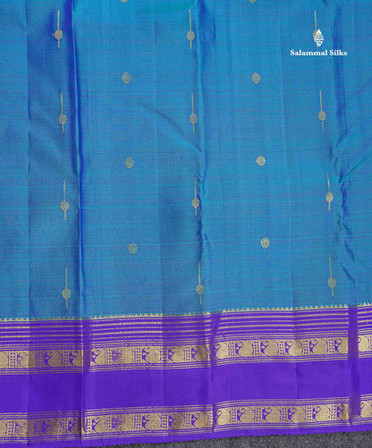 Pure Kanjivaram Silk Saree -Peacock Blue Colour Body Butta With Contrast Violet Traditional Gap Border