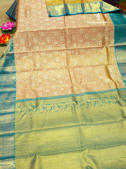Kanjivaram Peach Tissue Pure Silk Saree With Contrast Blue Border