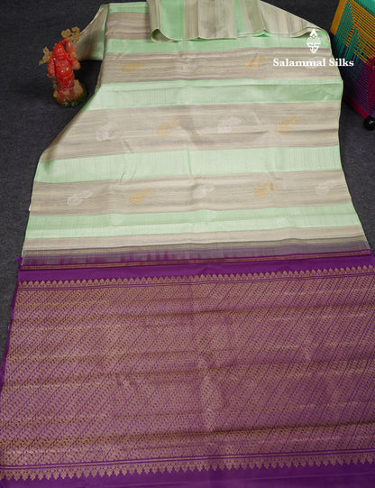 Beautiful Cream Sandal & Rexons Green Fancy Pure Kanjivaram Silk Saree With Contrast Dark Purple Blouse