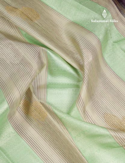 Beautiful Cream Sandal & Rexons Green Fancy Pure Kanjivaram Silk Saree With Contrast Dark Purple Blouse