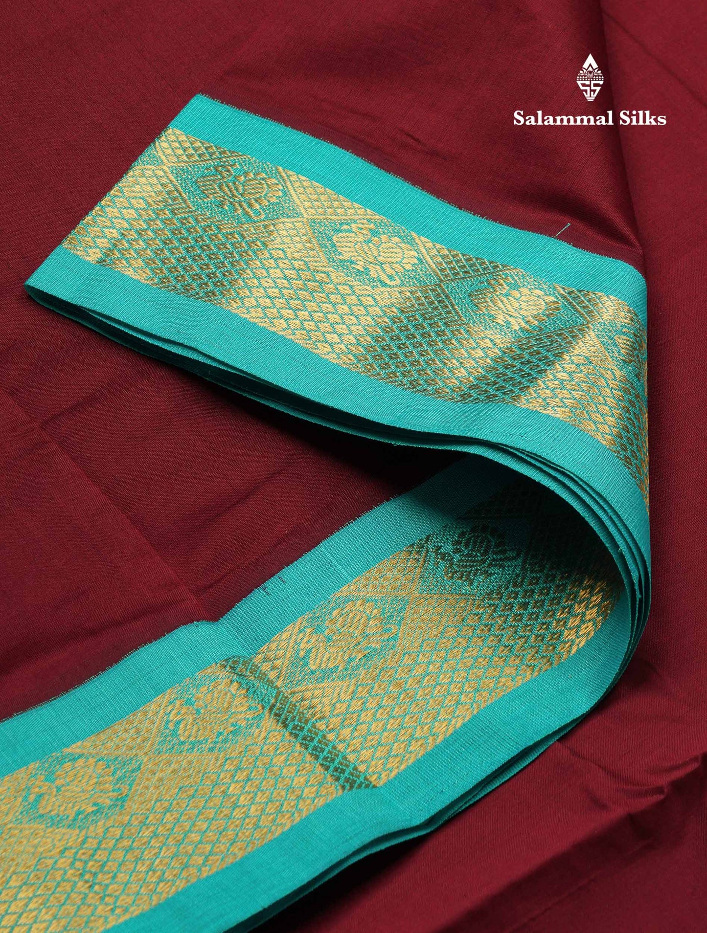 Beautiful Dark Maroon Plain 9 Yards Semi Silk Cotton Saree With Contrast Sapphire Green Traditional Border