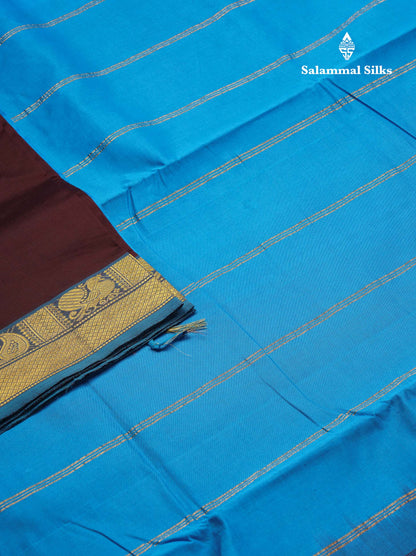 Beautiful Dark Brown Plain 10 Yards Semi Silk Cotton Saree With Contrast Blue Traditional Border