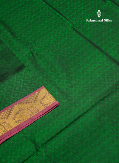 Beautiful Bottle Green Empose Design Pure Silk Cotton Saree With Gold Zari Borer