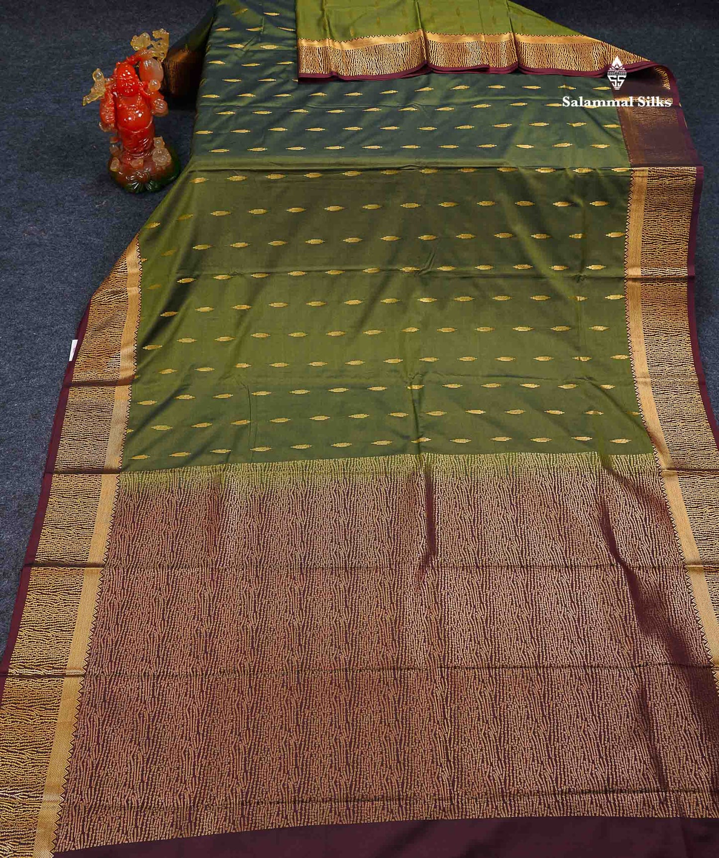 Beautiful Olive Green Malli Moggu Butta Semi Silk Saree With Contrast Dark Brown Fancy Border