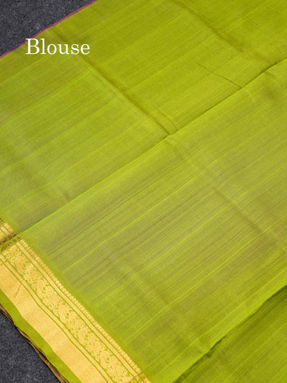 Dark Purple Pure Silk Cotton Saree With Contrast Parrot Green Blouse