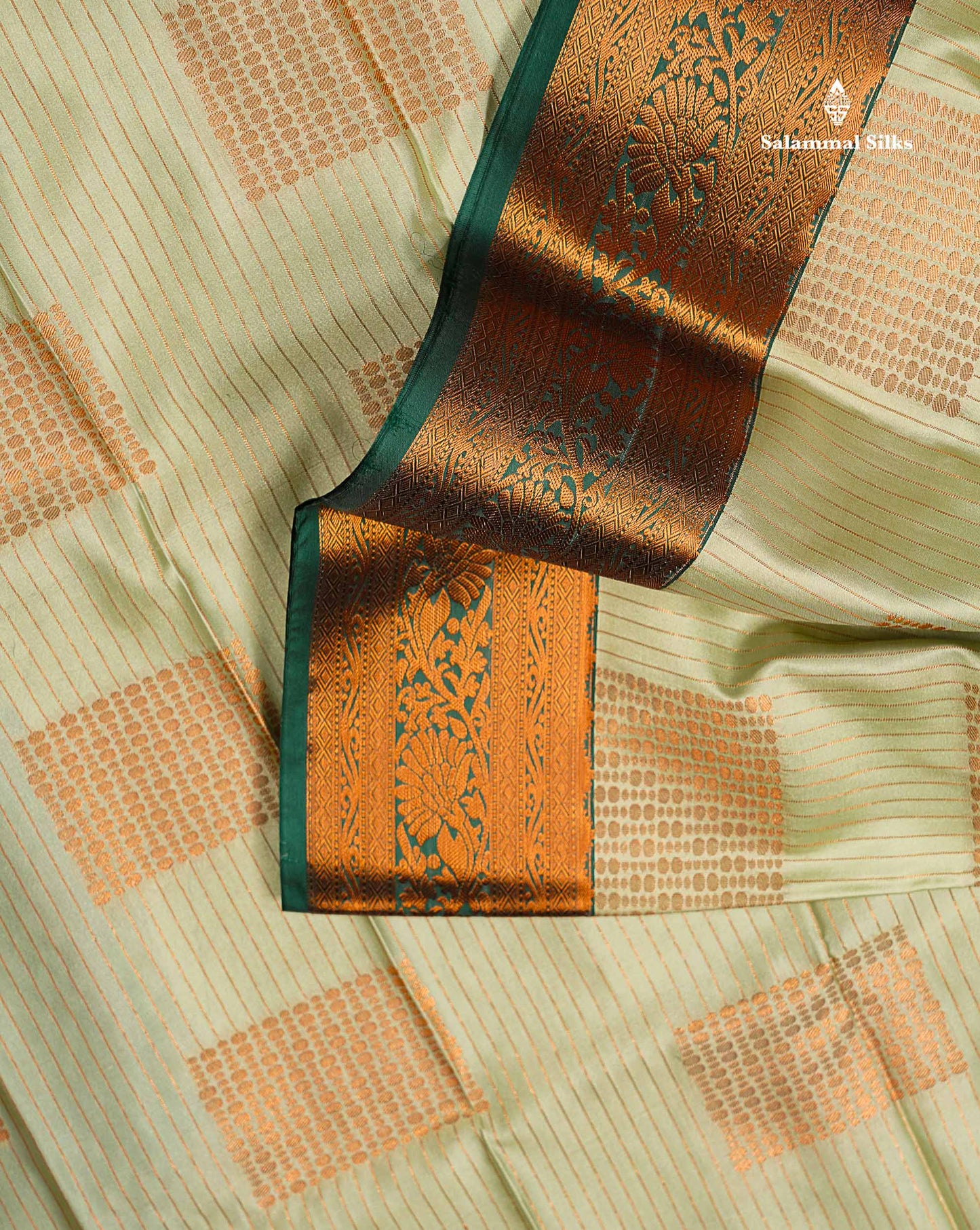 Beautiful Light Elaichi Green Zari Lines With Butta Semi Silk Saree With Contrast Bottle Green Traditional Border