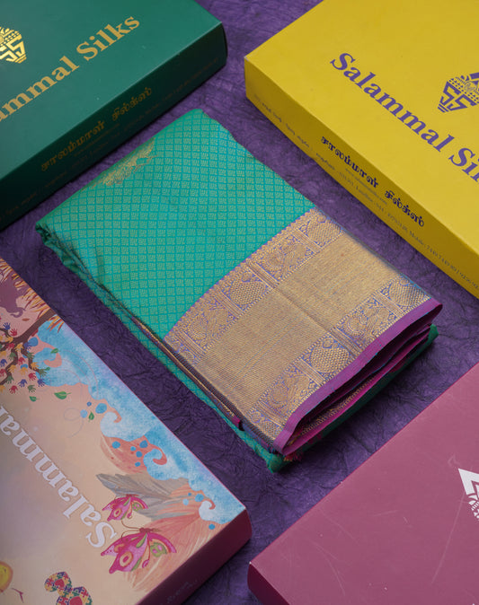 Beautiful Sapphire Green Pure Kanjivaram Silk Jacquard Saree With Contrast Purple Traditional Border