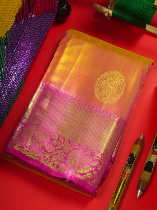 Kanjivaram Pinkkish Peach Pure Silk Saree With Magenta Rose Border
