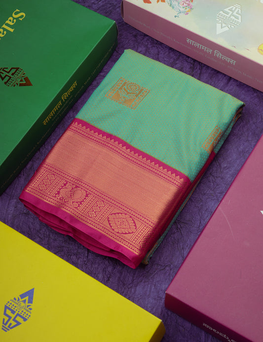 Dual Tone Pastel Blue Semi Silk Saree With Contrast Pink Border