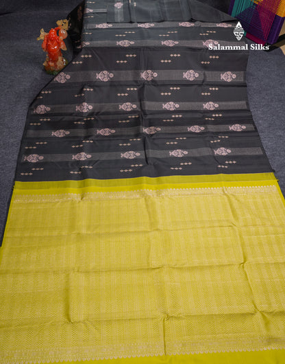 Black Fancy Pure Kanjivaram Silk Saree With Contrast Manthulir Yellow Blouse