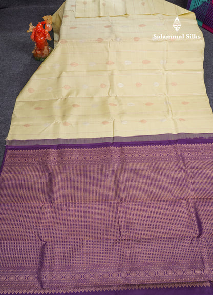 Cream Yellow Fancy Pure Kanjivaram Silk Saree With Contrast Dark Purple Blouse