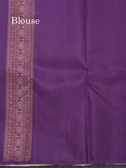 Cream Yellow Fancy Pure Kanjivaram Silk Saree With Contrast Dark Purple Blouse