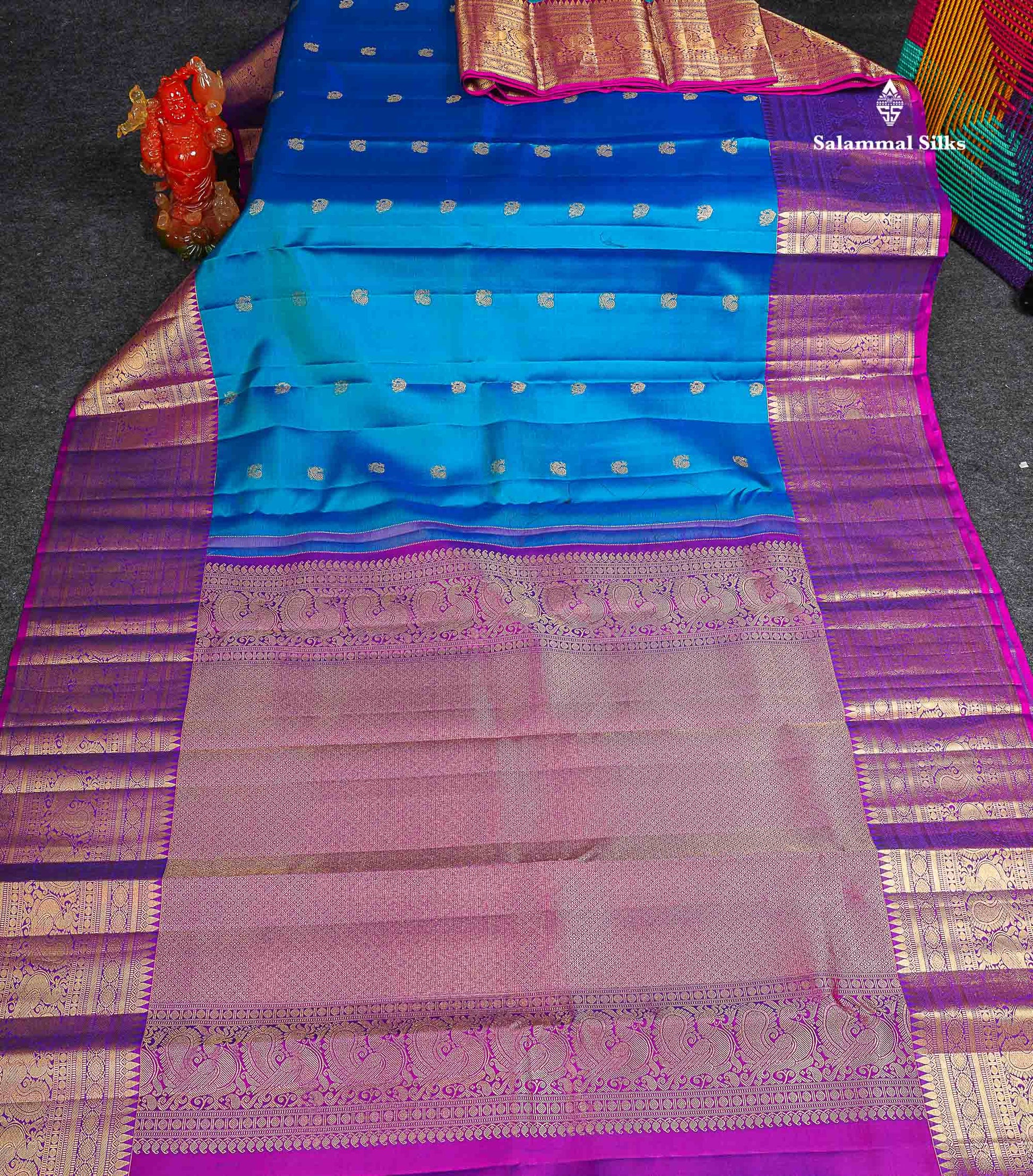 Pure Kanjivaram Silk Saree - Peacock Blue Colour Body With Butta & Contrast Vadamalli Long Border