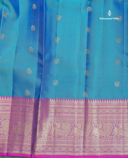 Pure Kanjivaram Silk Saree - Peacock Blue Colour Body With Butta & Contrast Vadamalli Long Border