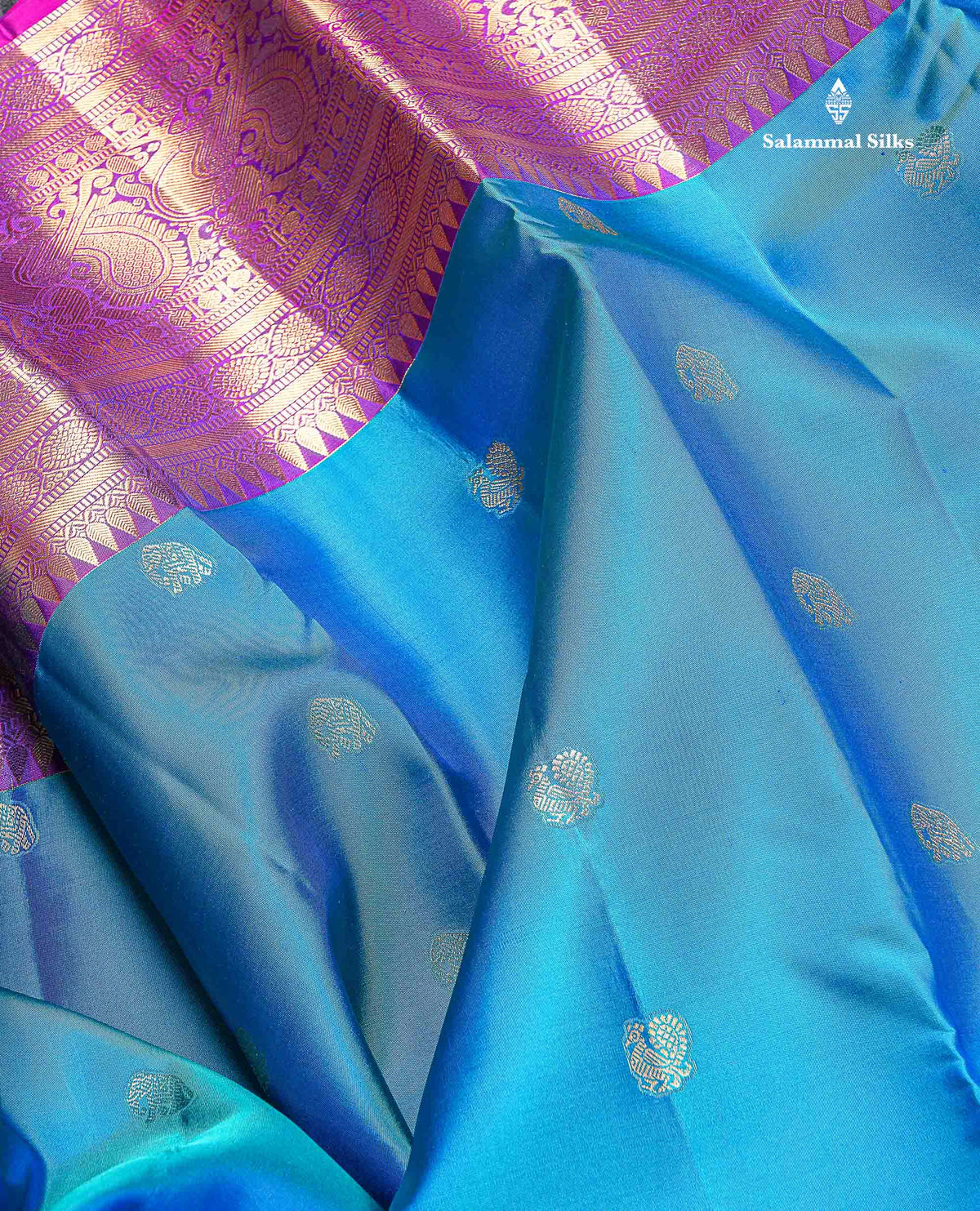 Pure Kanjivaram Silk Saree - Peacock Blue Colour Body With Butta & Contrast Vadamalli Long Border