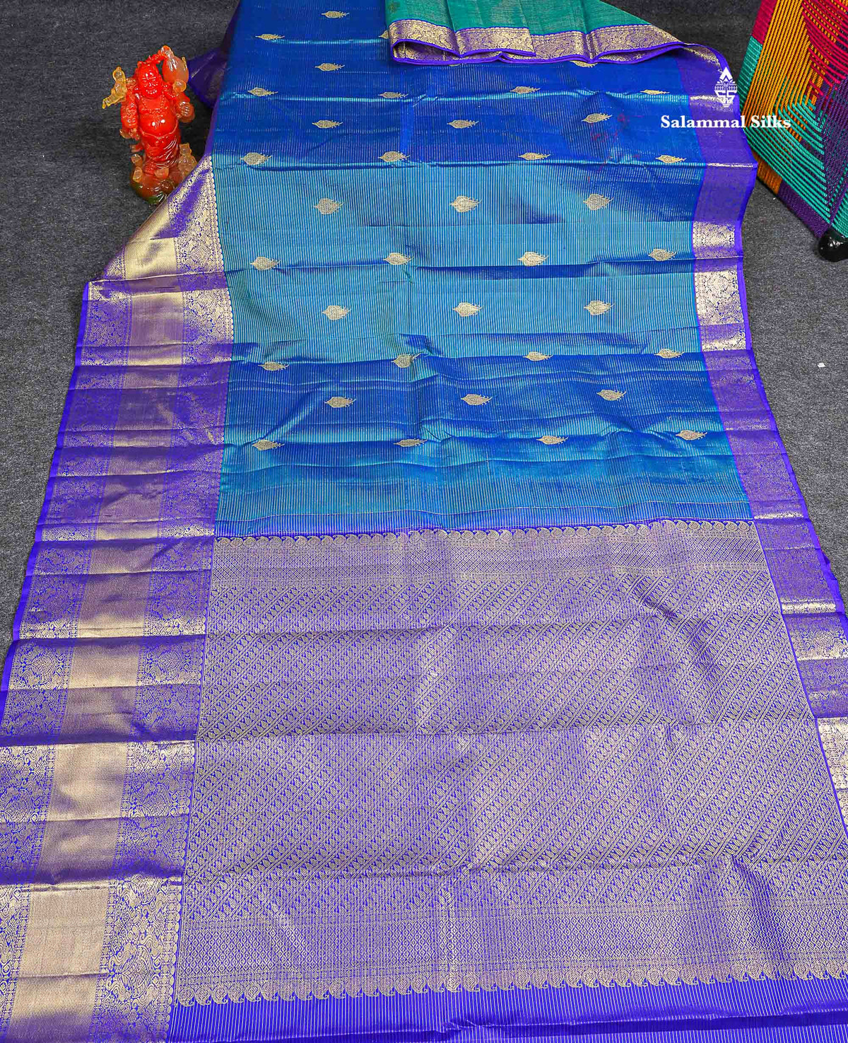 Pure Kanjivaram Silk Saree - Peacock Blue Colour Body Zari Lines With Butta & Contrast Violet Traditional Evening Morning Border 