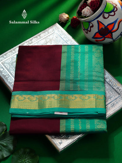 Beautiful Dark Maroon Plain 9 Yards Semi Silk Cotton Saree With Contrast Sapphire Green Traditional Border