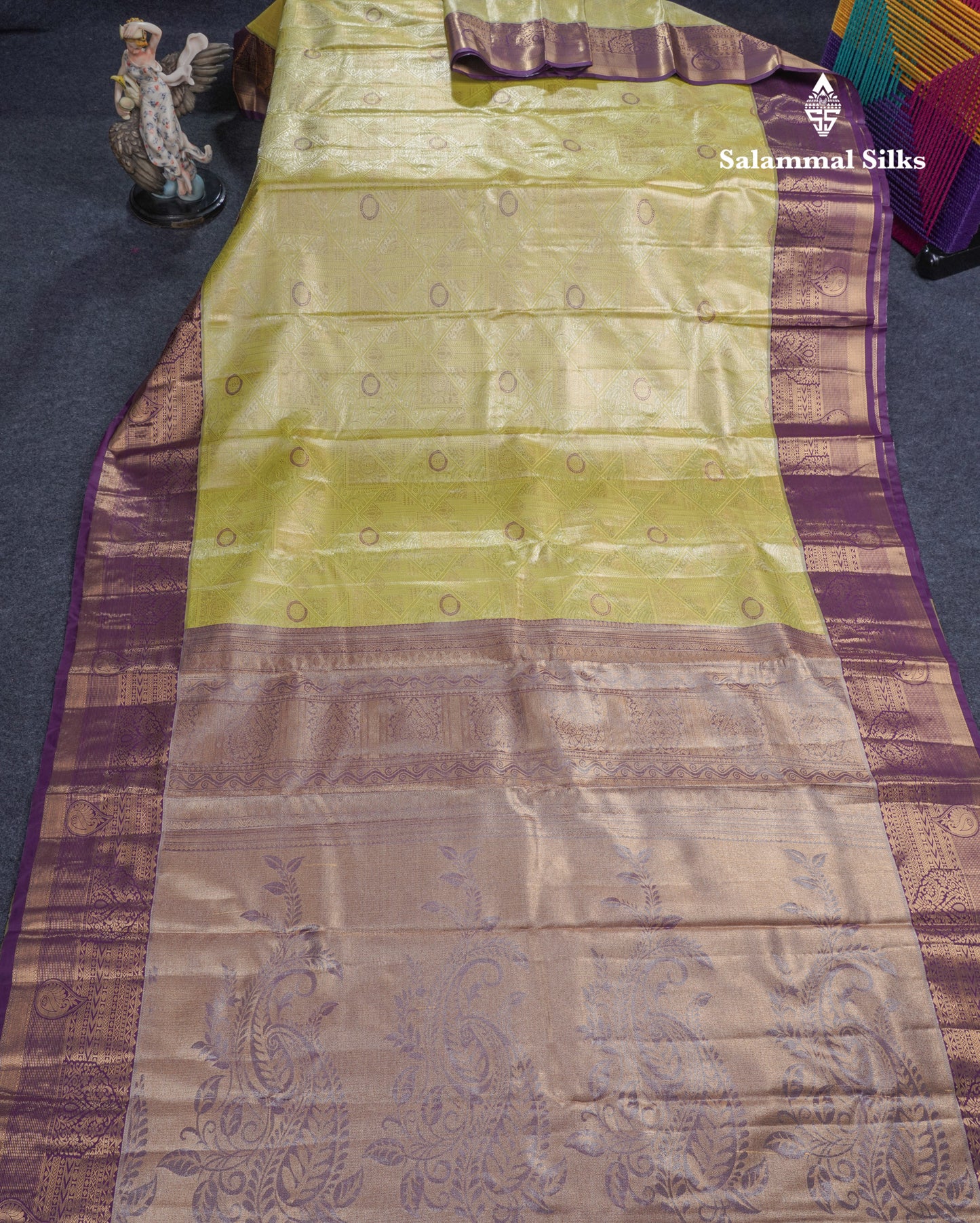 Lavender Geometric Pattern Tissue Bridal Semi Silk Saree With Contrast Peacock Green Traditional Border
