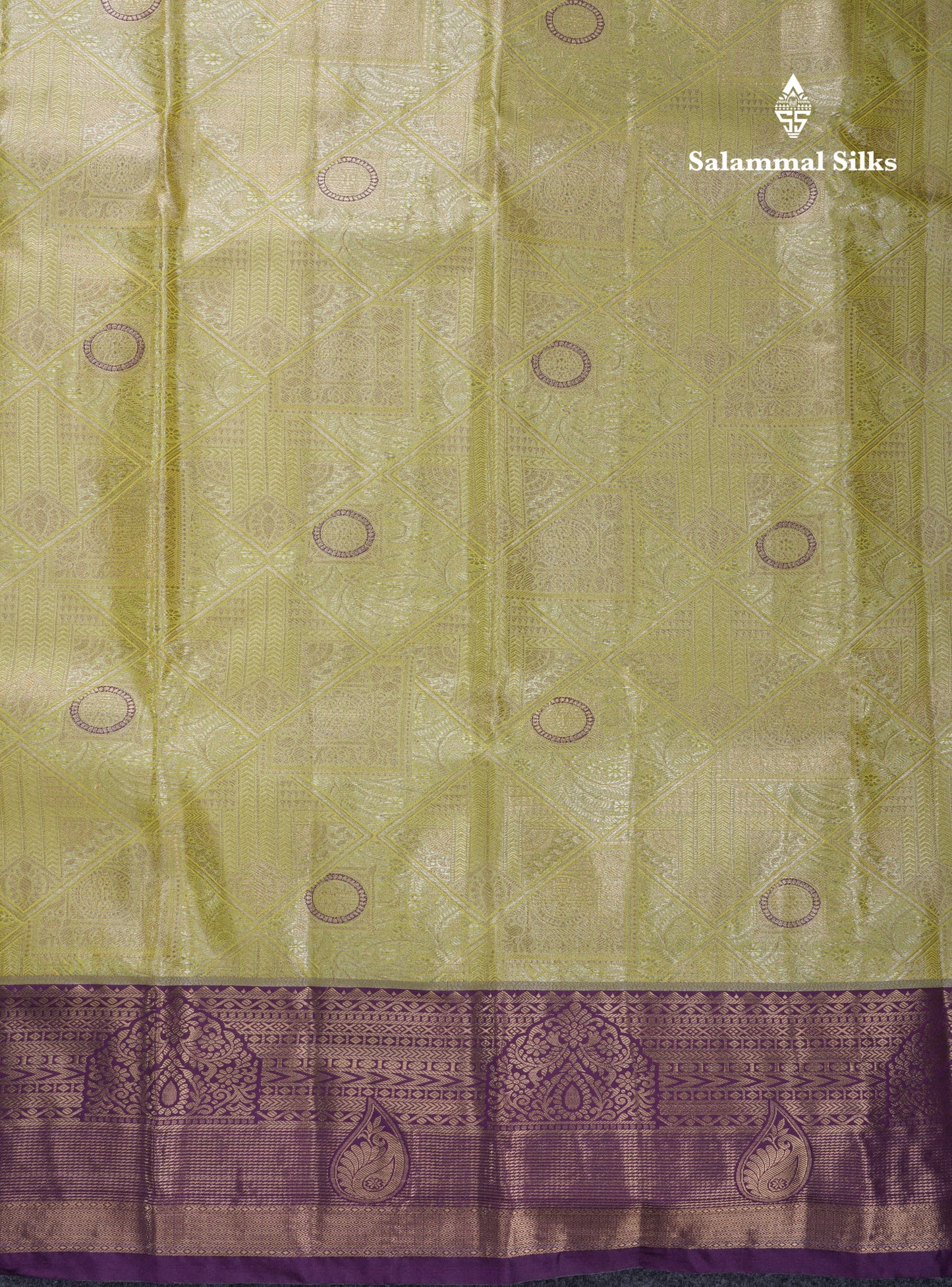 Lavender Geometric Pattern Tissue Bridal Semi Silk Saree With Contrast Peacock Green Traditional Border