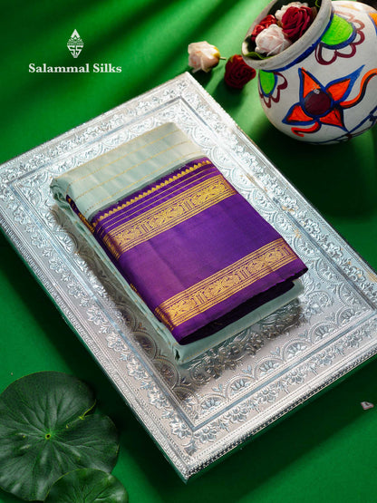 Korvai Beautiful Ice Blue Pure Kanjivaram Silk Saree With Contrast Dark Purple Traditional Rettapet Border
