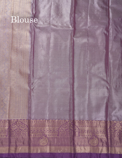 Lavender Geometric Pattern Tissue Bridal Semi Silk Saree With Contrast Peacock Green Traditional Border
