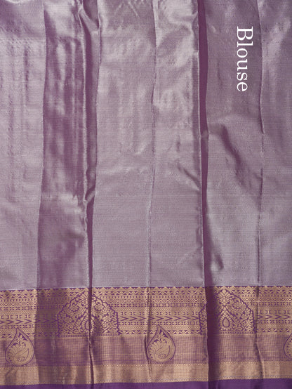 Lavender Geometric Pattern Tissue Bridal Semi Silk Saree With Contrast Peacock Green Traditional Border