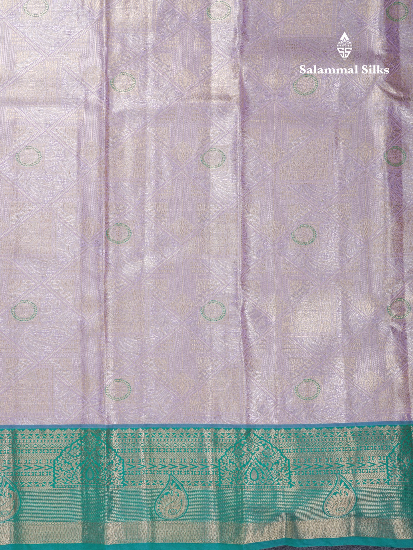 Lavender Geometric Pattern Tissue Bridal Semi Silk Saree With Contrast Peacock Green Traditional Border