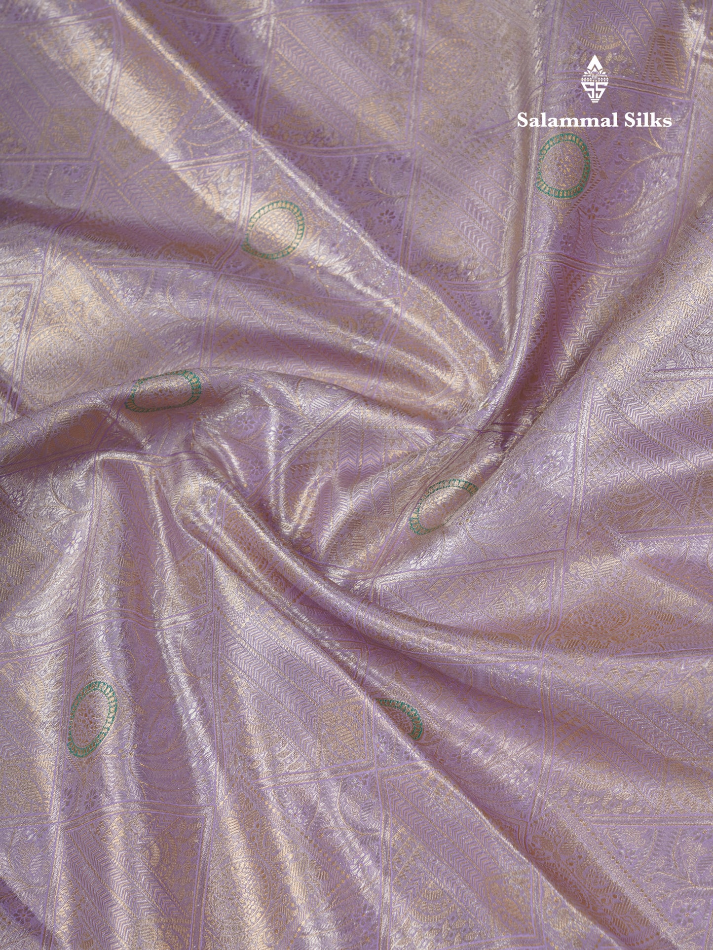 Lavender Geometric Pattern Tissue Bridal Semi Silk Saree With Contrast Peacock Green Traditional Border