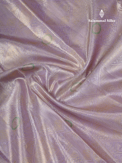 Lavender Geometric Pattern Tissue Bridal Semi Silk Saree With Contrast Peacock Green Traditional Border