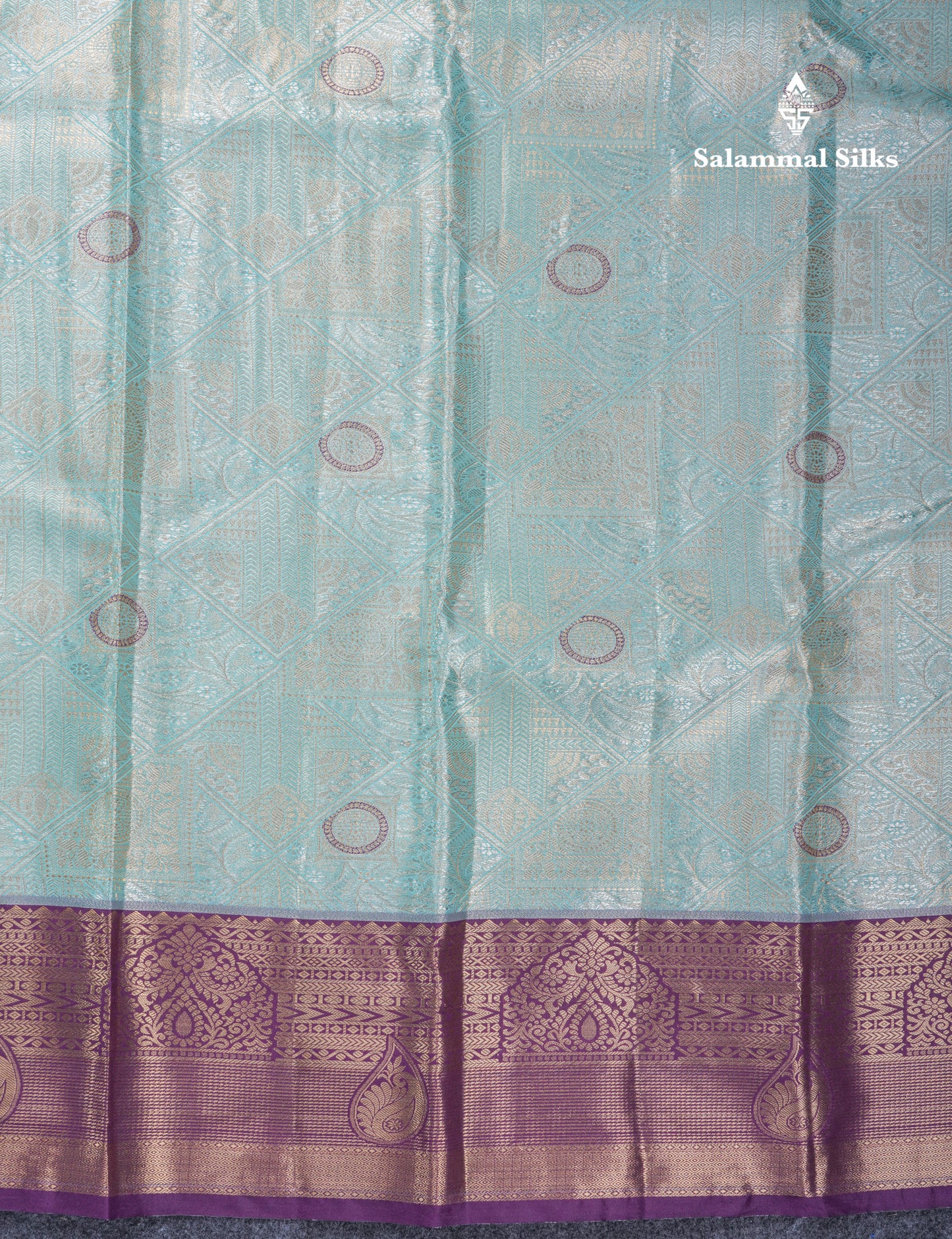 Lavender Geometric Pattern Tissue Bridal Semi Silk Saree With Contrast Peacock Green Traditional Border