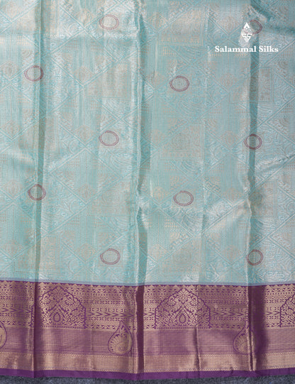 Lavender Geometric Pattern Tissue Bridal Semi Silk Saree With Contrast Peacock Green Traditional Border