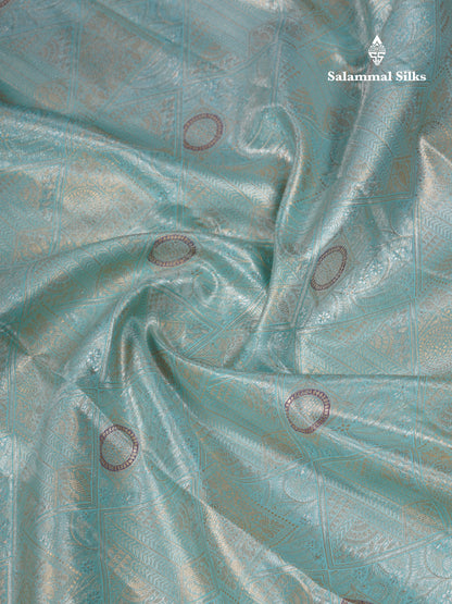 Lavender Geometric Pattern Tissue Bridal Semi Silk Saree With Contrast Peacock Green Traditional Border
