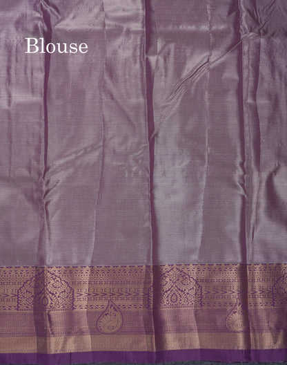 Lavender Geometric Pattern Tissue Bridal Semi Silk Saree With Contrast Peacock Green Traditional Border