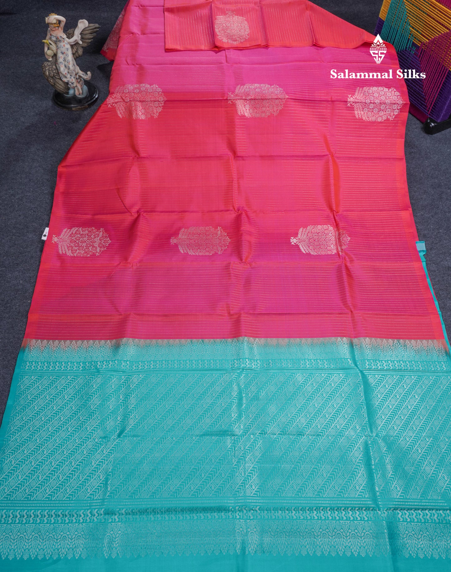 Dual Tone Pinkish Orange Pure Kanjivaram Silk Saree With Contrast Sapphire Green Blouse