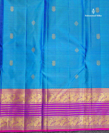 Pure Kanjivaram Silk Saree - Peacock Blue Colour Body Vaira Oosi Lines With Butta & Contrast Magenta Pink Border