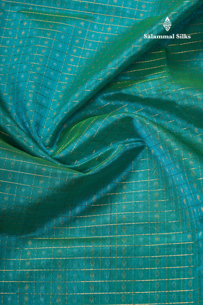 Pure Silk Cotton Dual Tone Sea Green Traditional Checks And Gold Silver Zari Lakshadeepam Buttas With Brown Border