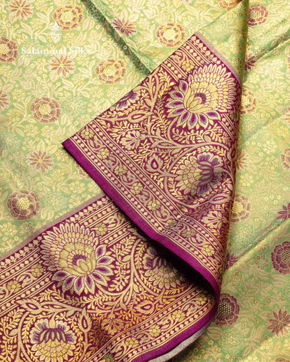 Beautiful Light Green Tissue Bridal Pure Kanjivaram Silk Saree With Contrast Dark Purple Menakari Work Border