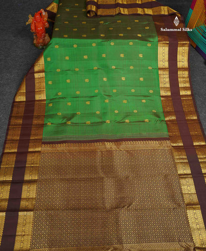 Pure Kanjivaram Silk Saree - Bottle Green Colour Body Zari Butta With Contrast Dark Brown Gap Border