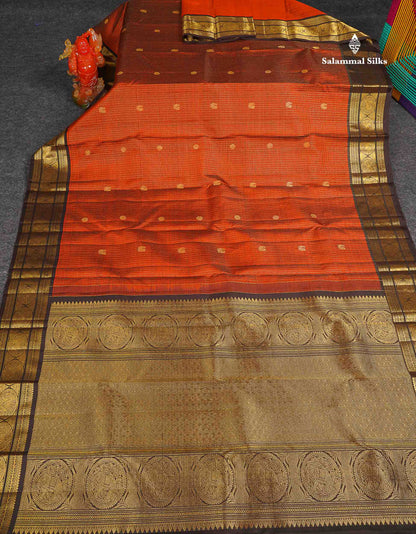 Pure Kanjivaram Silk Saree - Rust Orange Colour Body Checks With Butta & Contrast Dark Brown Traditional Border