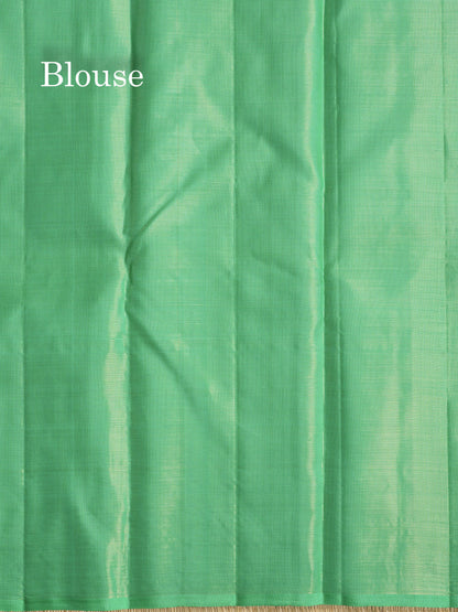 Orange Fancy Vairaoosi Pure Kanjivaram Silk Saree with Contrast Rexona Green Blouse