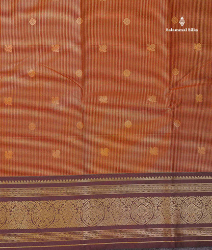 Beautiful Rust Orange Vaira Oosi Checks With Butta Semi Silk Saree With Contrast Dark Brown Traditional Border