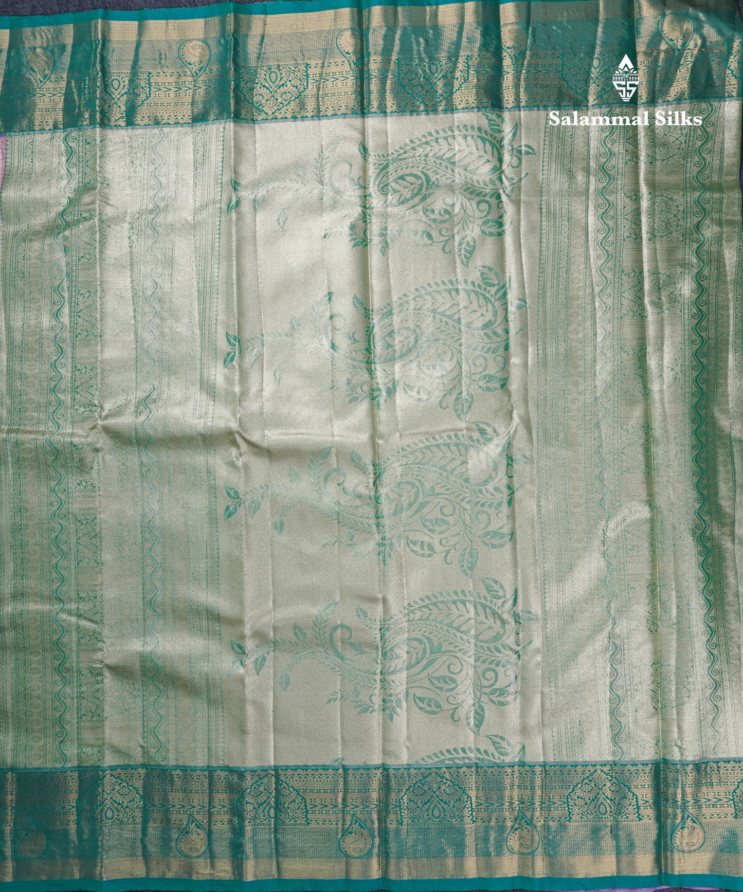 Dark Peach Geometric Pattern Tissue Bridal Semi Silk Saree With Contrast Peacock Green Traditional Border