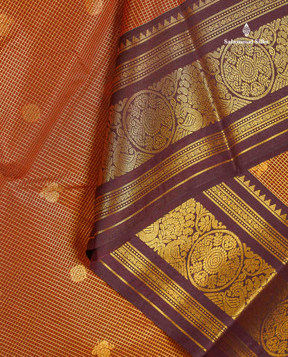 Beautiful Rust Orange Vaira Oosi Checks With Butta Semi Silk Saree With Contrast Dark Brown Traditional Border