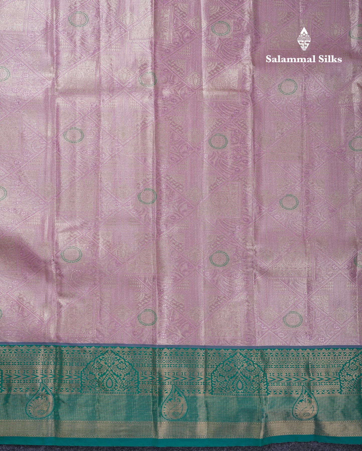 Dark Peach Geometric Pattern Tissue Bridal Semi Silk Saree With Contrast Peacock Green Traditional Border