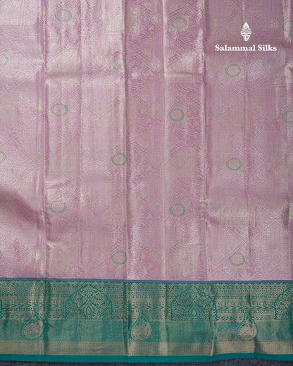 Dark Peach Geometric Pattern Tissue Bridal Semi Silk Saree With Contrast Peacock Green Traditional Border