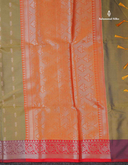 Beautiful Dual Tone Olive Green Zari Butta Semi Soft Silk Saree With Contrast Orange Blouse