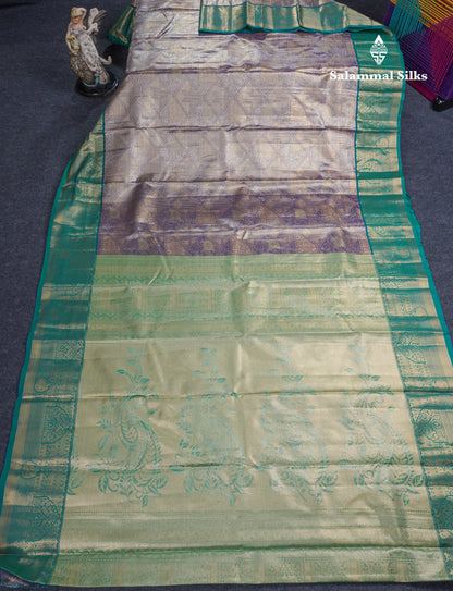 Dark Peach Geometric Pattern Tissue Bridal Semi Silk Saree With Contrast Peacock Green Traditional Border