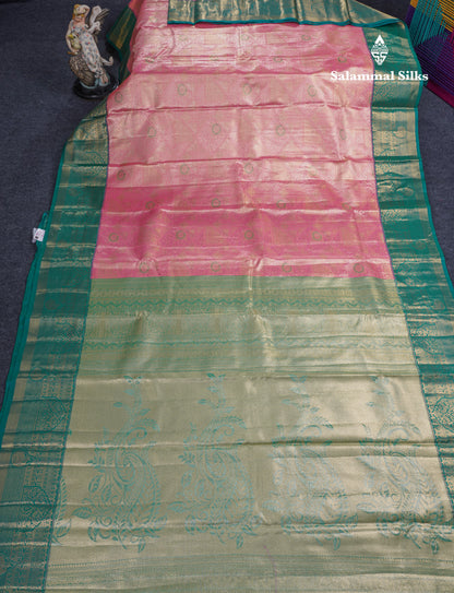 Dark Peach Geometric Pattern Tissue Bridal Semi Silk Saree With Contrast Peacock Green Traditional Border