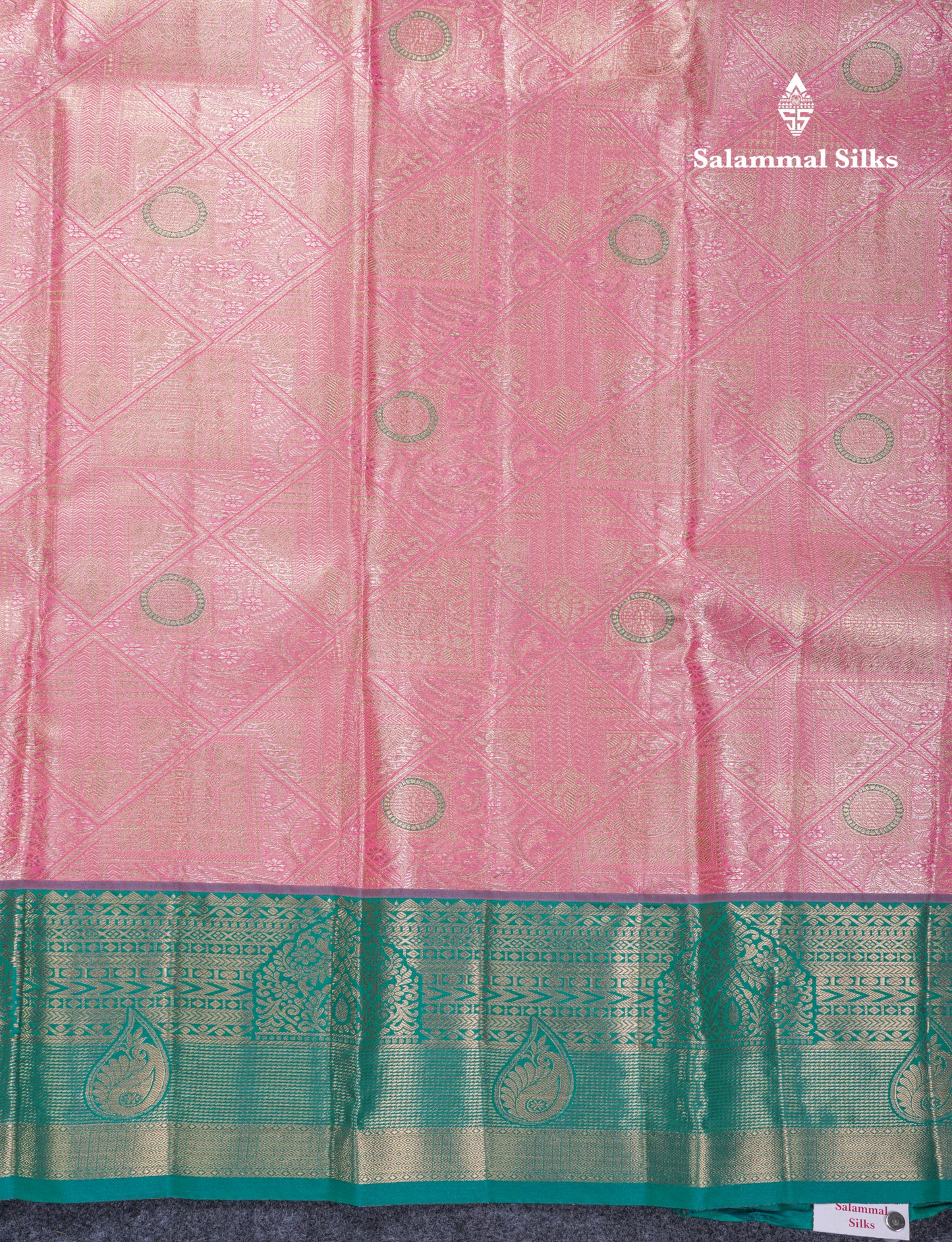 Dark Peach Geometric Pattern Tissue Bridal Semi Silk Saree With Contrast Peacock Green Traditional Border