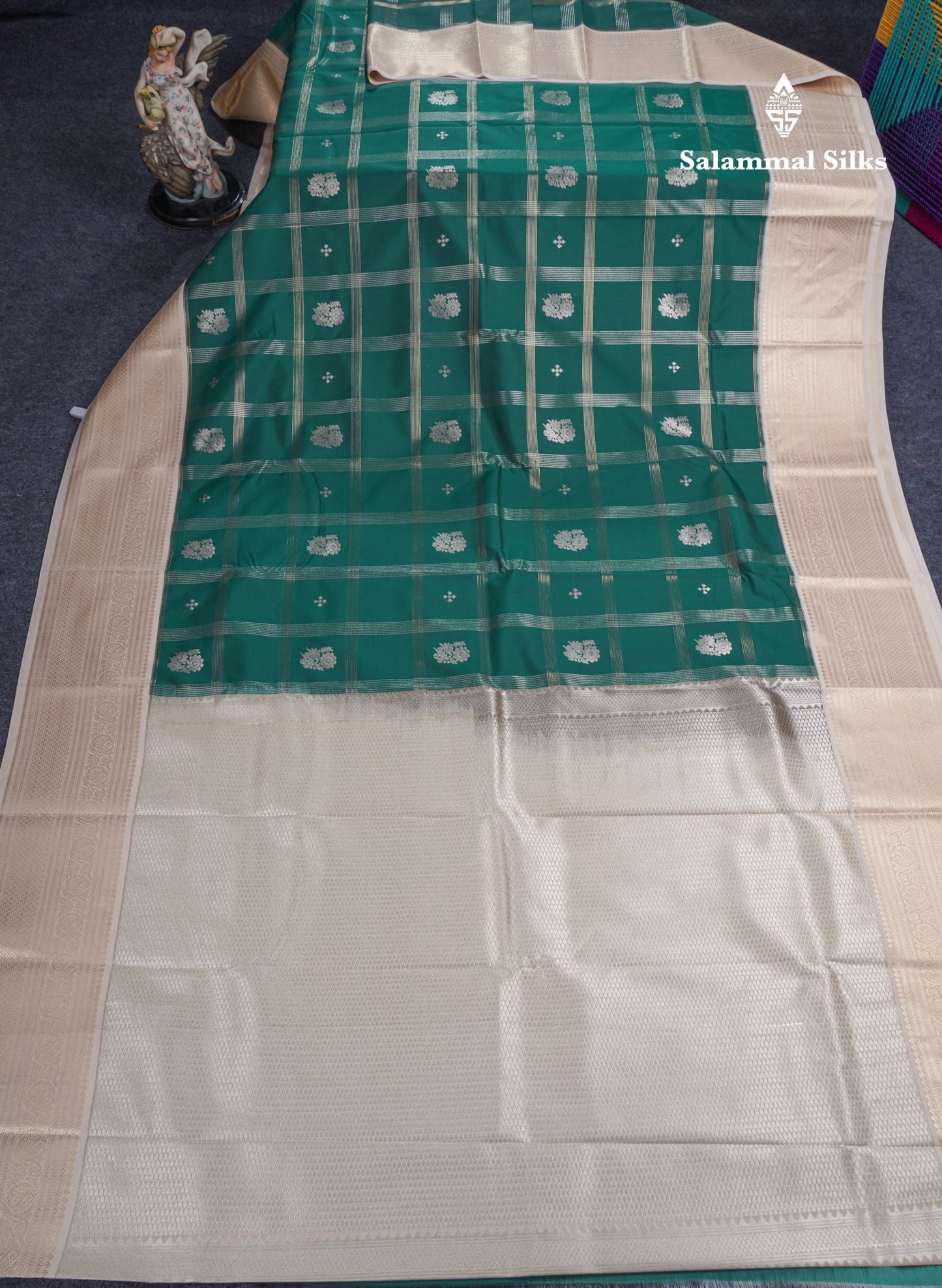 Bottle Green Semi Silk Saree With Contrast Cream Sandal Border